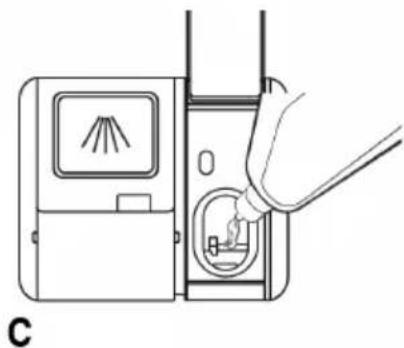 Diagram of a hand inserting a plug into a device with a fan-like icon, labeled 'C' (no text or symbols on the diagram itself)