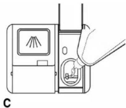Line drawing of a hand inserting a plug into a device with a handle, labeled 'C' (no text or symbols on the diagram itself)