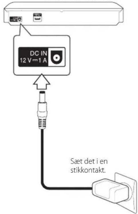 DC IN 12 V=1 A Sæt det i en stikkontakt.