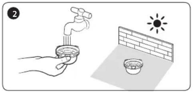 Illustration showing a hand washing a faucet with a sun symbol above a brick wall and a bowl on a surface (no text or symbols).