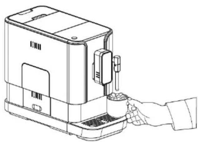 Line drawing of a hand inserting a small container into a device (no text or symbols)