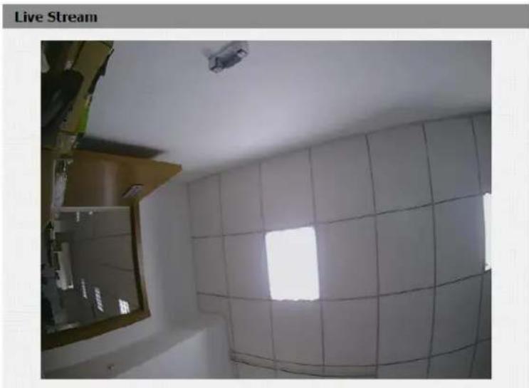 Interior view of a kitchen with tiled walls and a window light, no visible text or symbols