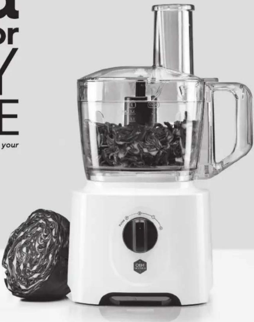 White kitchen blender with a clear plastic lid and a textured cloth beside it, no visible text or symbols on the device itself.