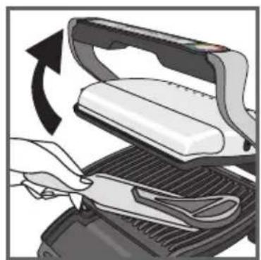Illustration of a hand using a power iron to clean or install a device, with no visible text or symbols.