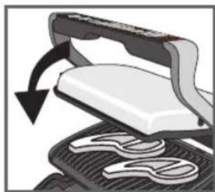 Close-up of a mechanical device with a curved arrow indicating rotation or movement (no text or symbols visible)