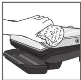 Illustration of hands cleaning a textured object on a mechanical device (no text or symbols visible)
