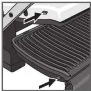 Close-up of a car's grille and roof structure with directional arrows indicating components (no text or symbols)