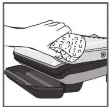 Illustration of hands cleaning a textured object from a machine (no text or symbols visible)