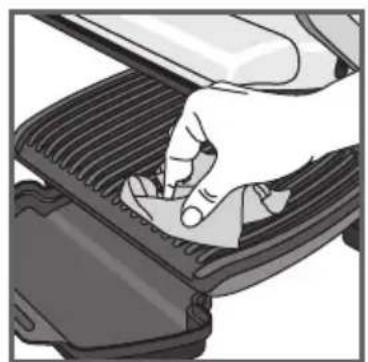 Hand pressing down on a computer keyboard (no text or symbols visible)