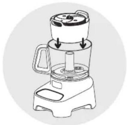 Line drawing of a blender with lid and side handle, showing internal components and arrows indicating motion (no text or symbols)