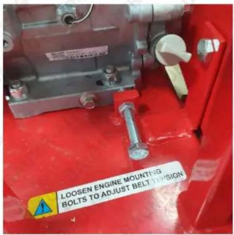 LOOSEN ENGINE MOUNTING BOLTS TO ADJUST BELT TENSION