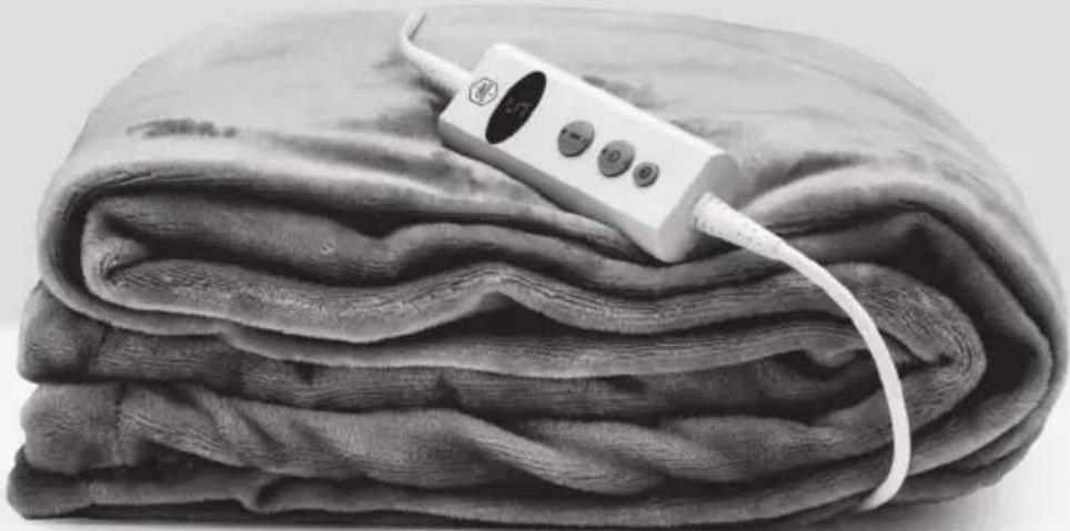 Folded fabric with a medical or electrical device attached, no visible text or symbols