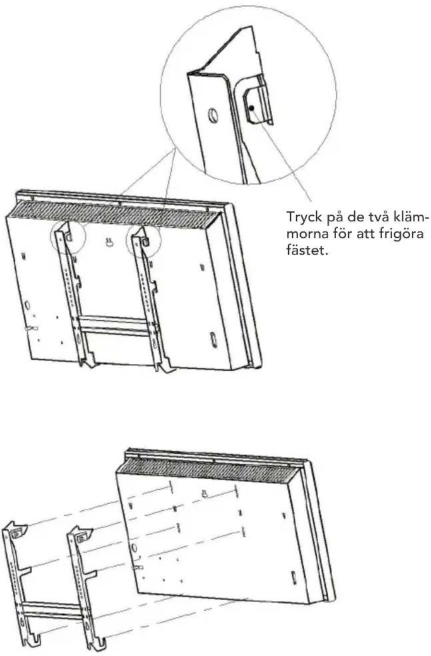 Tryck på de två klämmorna för att frigöra fästet.