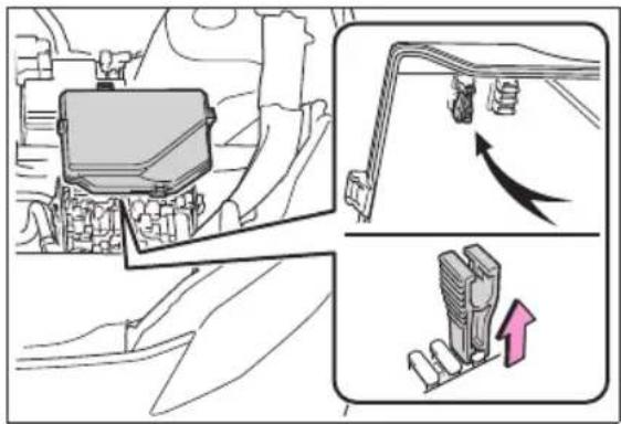 Diagram illustrating vehicle engine components with directional arrows and component placement, including a top view of the engine.