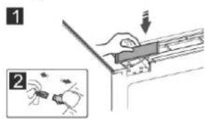 Diagram showing a hand holding a rectangular object with an arrow, labeled with parts 1 and 2, and a magnified inset illustrating the process.