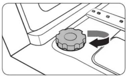 Diagram of a mechanical device with a gear and curved arrow indicating rotation (no text or symbols)
