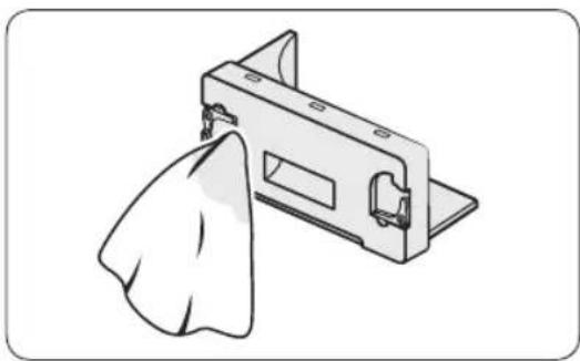 Illustration of a metal bracket with a cloth hanging from its side (no text or symbols)