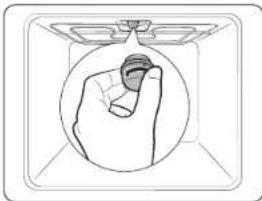Simple line drawing of a hand holding a small object inside a circular frame (no text or symbols)