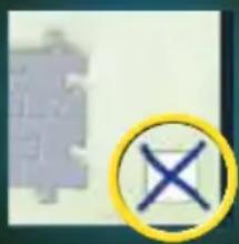 Image containing a puzzle piece icon and a yellow circular symbol with a blue 'X' inside.