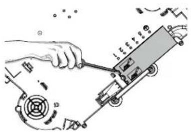 Technical diagram showing a hand using a tool to adjust or install a mechanical component with labeled parts and motion indicators.