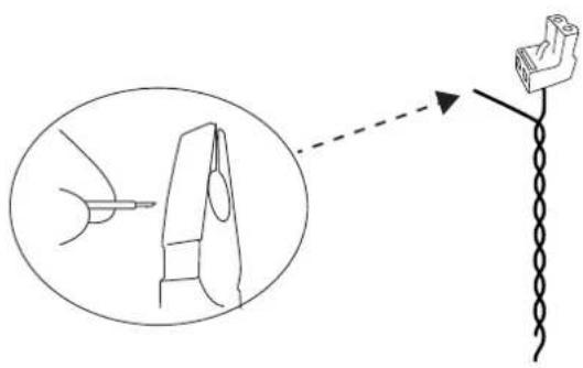 Diagram illustrating a mechanical or electrical setup with a pin inserted into a component and a hanging hook, accompanied by an inset showing the insertion process.