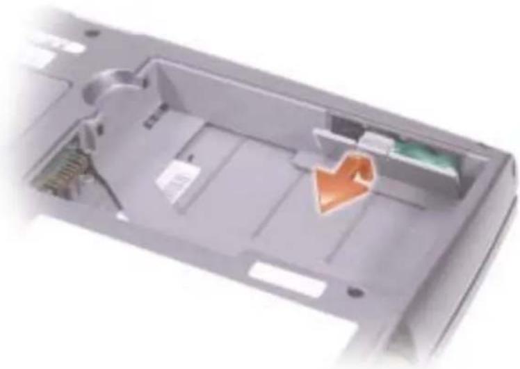 DELL Latitude D505 - Wyjmowanie i instalowanie akumulatora zapasowego - 1