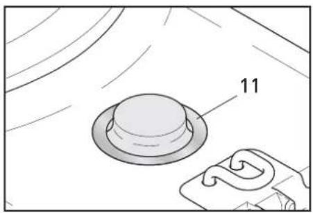 Illustration of a hat and a curved object on a surface, no text or symbols present