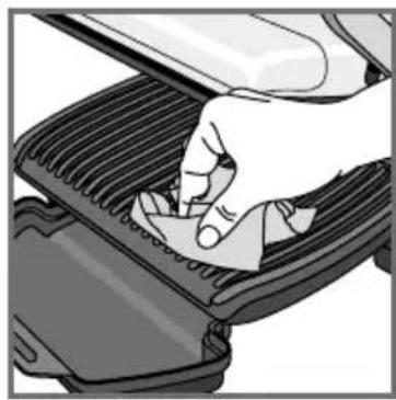 Close-up of a hand pressing down on a mechanical component (no visible text or symbols)