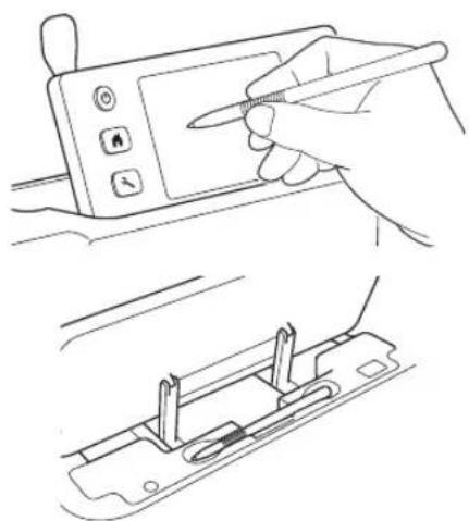 Line drawing showing a hand using a stylus to interact with a device, and a close-up of a clip holding a clip (no text or symbols)