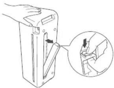 Line drawing of a hand holding a device with an arrow pointing to a component, and an inset magnified view showing a detail (no text or symbols)