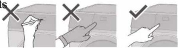 Diagram showing three hand gestures (×, ×, √) pointing to a vehicle, likely illustrating correct and incorrect handling or inspection.
