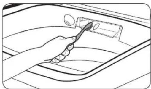 Line drawing of a hand using a tool to clean or store items inside a container (no text or symbols)