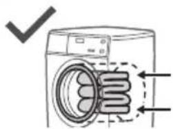 Diagram showing a washing machine with a coiled spring and checkmark indicating checkout status