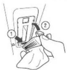 Diagram showing a hand holding a device with numbered parts, likely illustrating a cleaning or repair process.