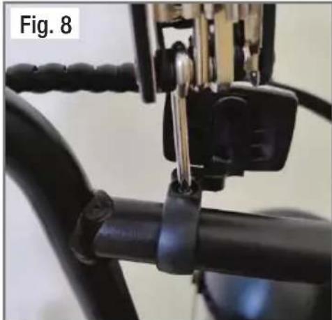 Close-up of a bicycle leg with black plastic clips and metal hardware (no text or symbols visible)