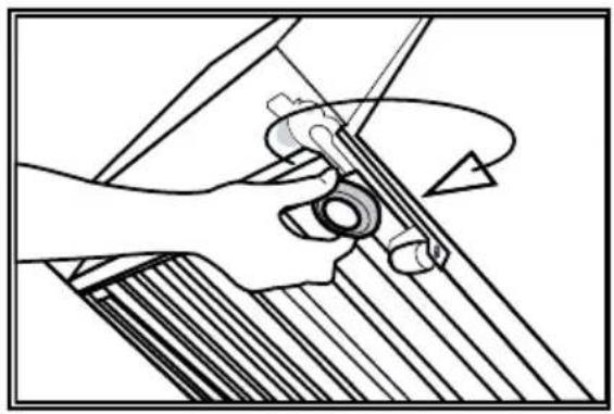 Mechanical diagram showing a hand operating a tool with a rotating arrow (no text or symbols)