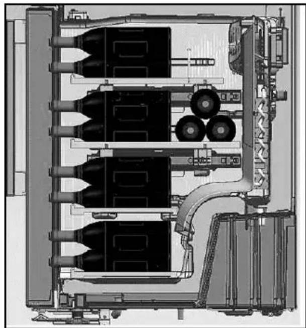 Cross-sectional technical diagram of an industrial machine or processing unit with multiple cylindrical components and piping (no visible text or labels)