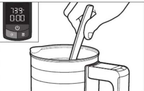 Line drawing of a hand stirring a cup with a wooden stick, next to a digital timer (no text or symbols on the diagram itself)