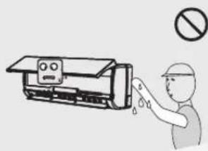 Safety warning illustration showing a person using a spray gun to prevent an air conditioner, with a no-smoking symbol above.