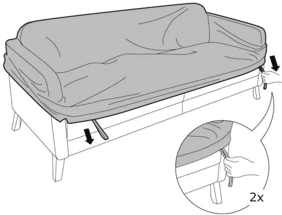 Illustration of a bed with a pillow and seat, showing a hand holding a tool near the backrest and a magnified inset of the side view (no text or symbols)