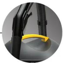 Close-up of a black rubber hose with yellow cable strap, no visible text or symbols