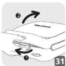 Diagram showing a hand holding a stack of books with labeled parts and directional arrows indicating movement or rotation.