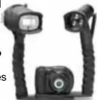 Two black-and-white photo cameras with headlights and a camera body, no visible text or symbols
