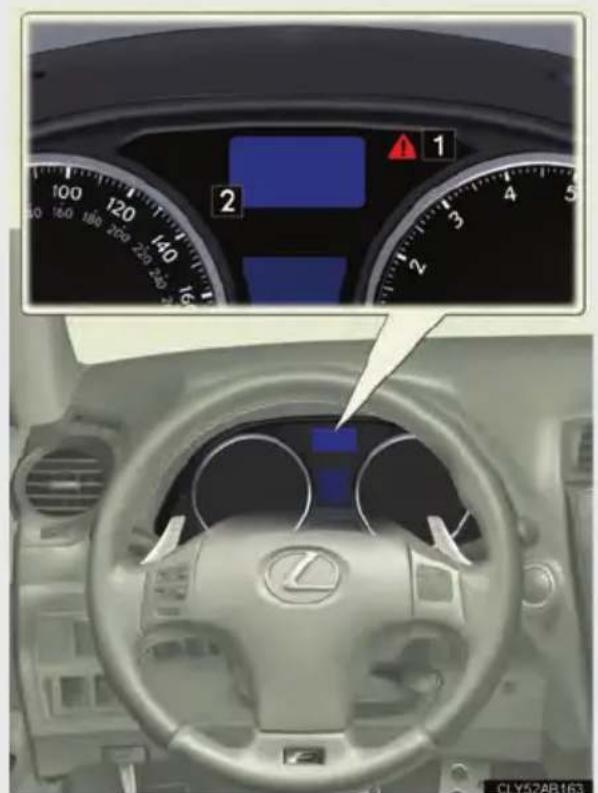 Car dashboard display showing speedometer, warning sign, and LAX logo with Chinese UI labels