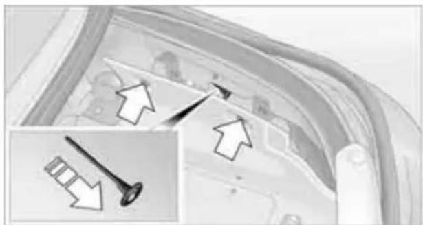 Close-up of a car's front bumper with an inset showing a screw and a magnified view of the head (no text or symbols)