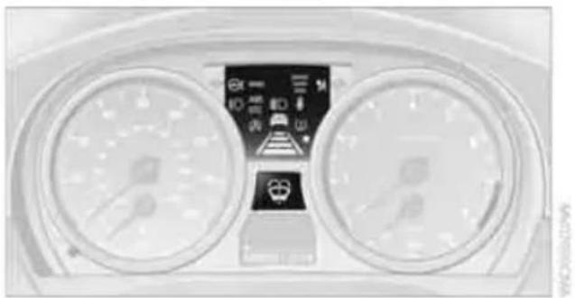 Front view of a car dashboard with dual gauges and a central control panel (no visible text or symbols)
