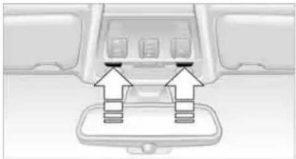 Interior view of a vehicle showing a car intake tray with two upward arrows pointing to the interior (no text or symbols visible)