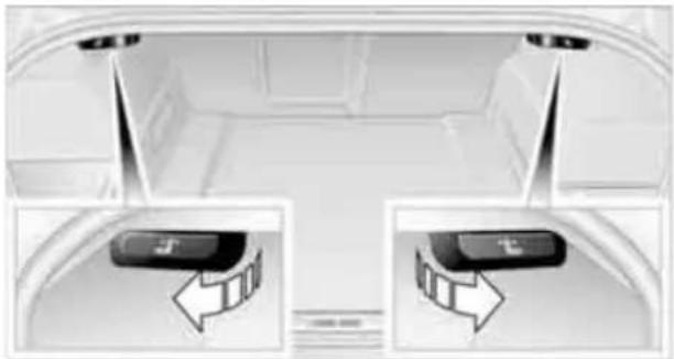 Interior view of a vehicle showing two car seats with directional arrows indicating movement or flow (no text or symbols)