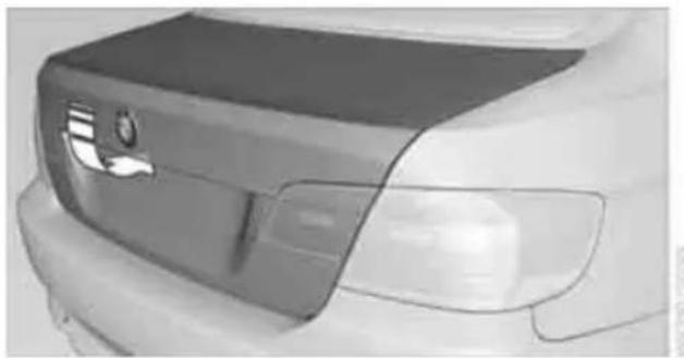 Front view of a car's rear bumper with visible grille and side light (no text or symbols)