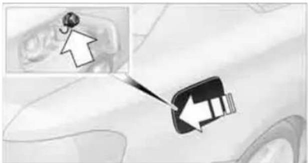 Diagram showing a car's seatbelt switch and a vehicle's wheel, with an inset highlighting the wheel (no text or symbols present)